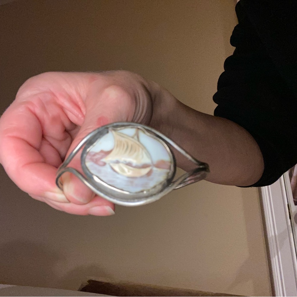 A solid sail boat bracelet. Perfect for the girl who loves the water & sailing!